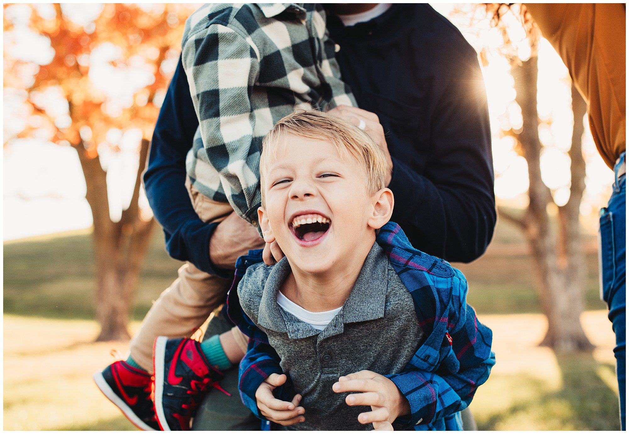 Family portrait session with 3 young kids at the Meadowbrook Park in Prairie Village kansas 
