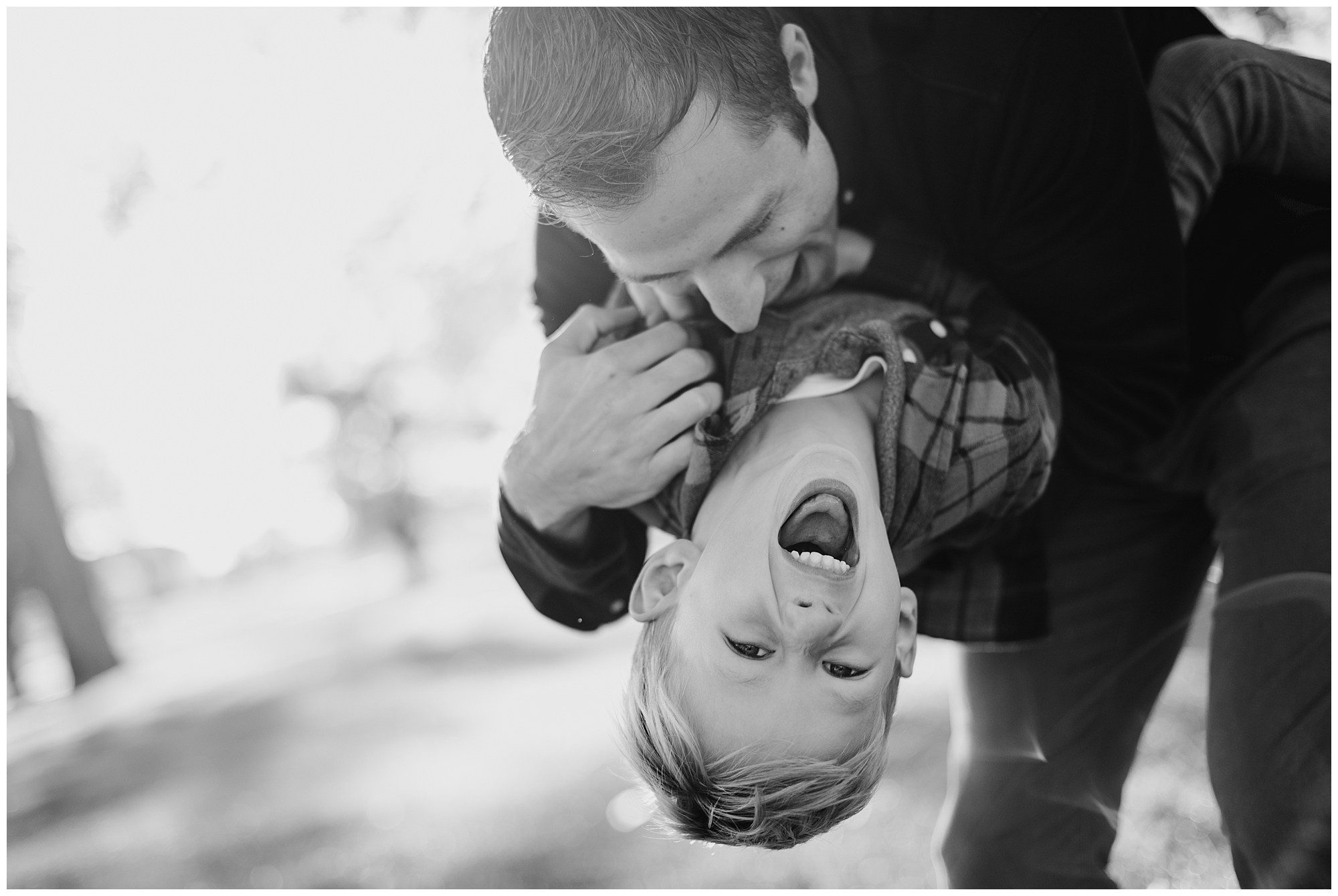 Documentary style family photography session at Meadowbrook Park in Kansas, capturing relationships and connections with each other.