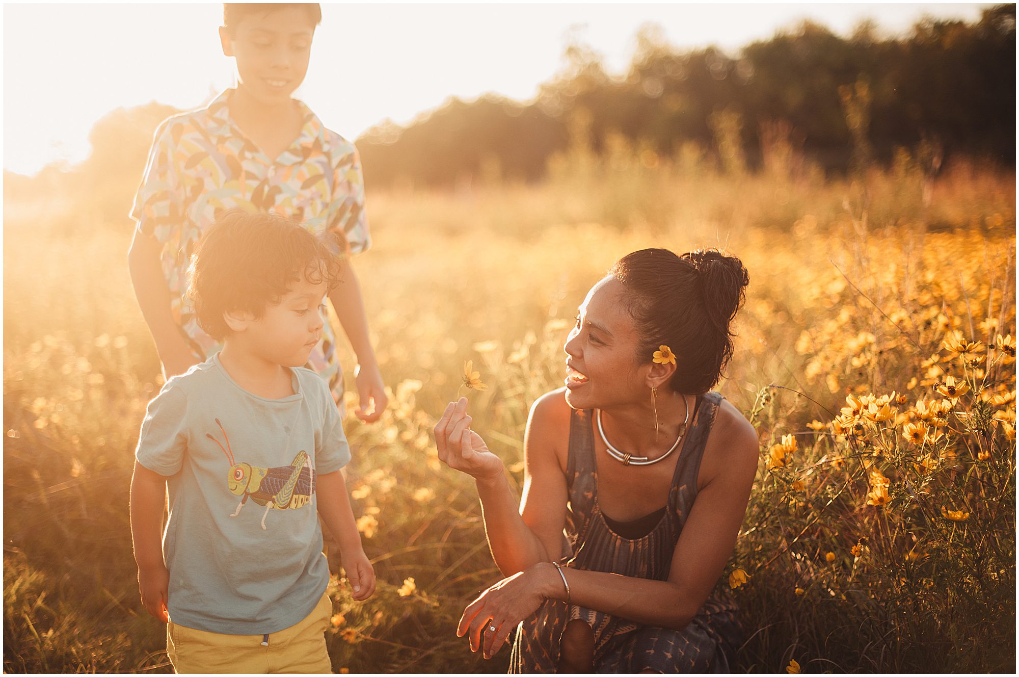 family portrait session in a Kansas Field full of wildflowers 