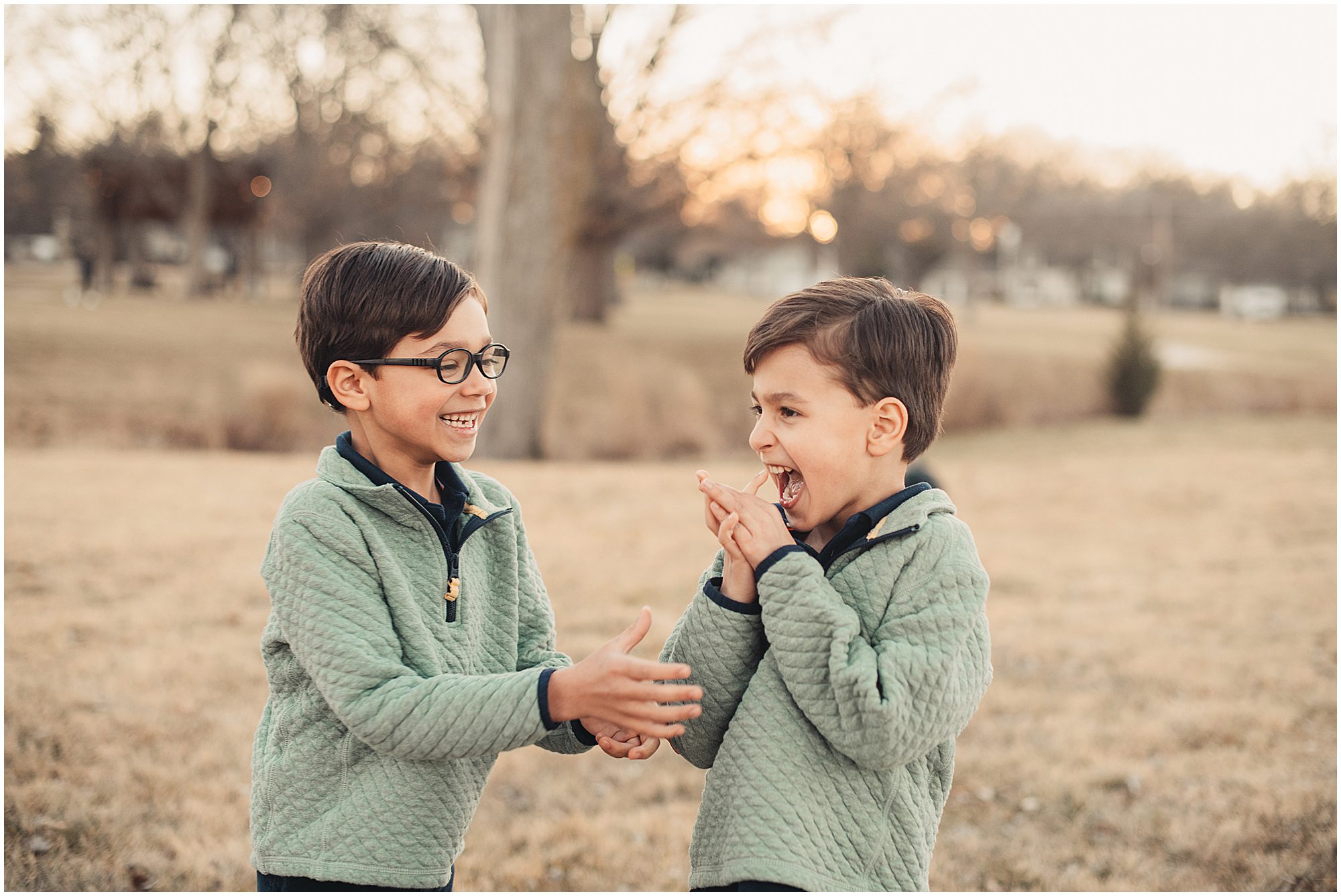 brothers playing at park